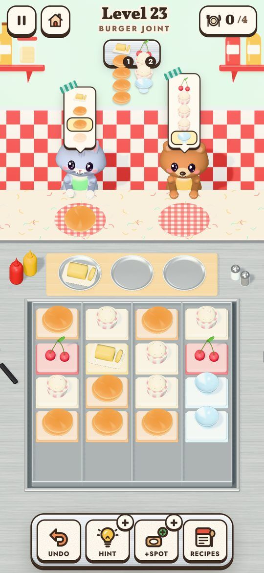 Level 23, the burger joint: two guests wait for pancakes and a sundae, above a pantry of pancakes, butter, cherries and ice cream.