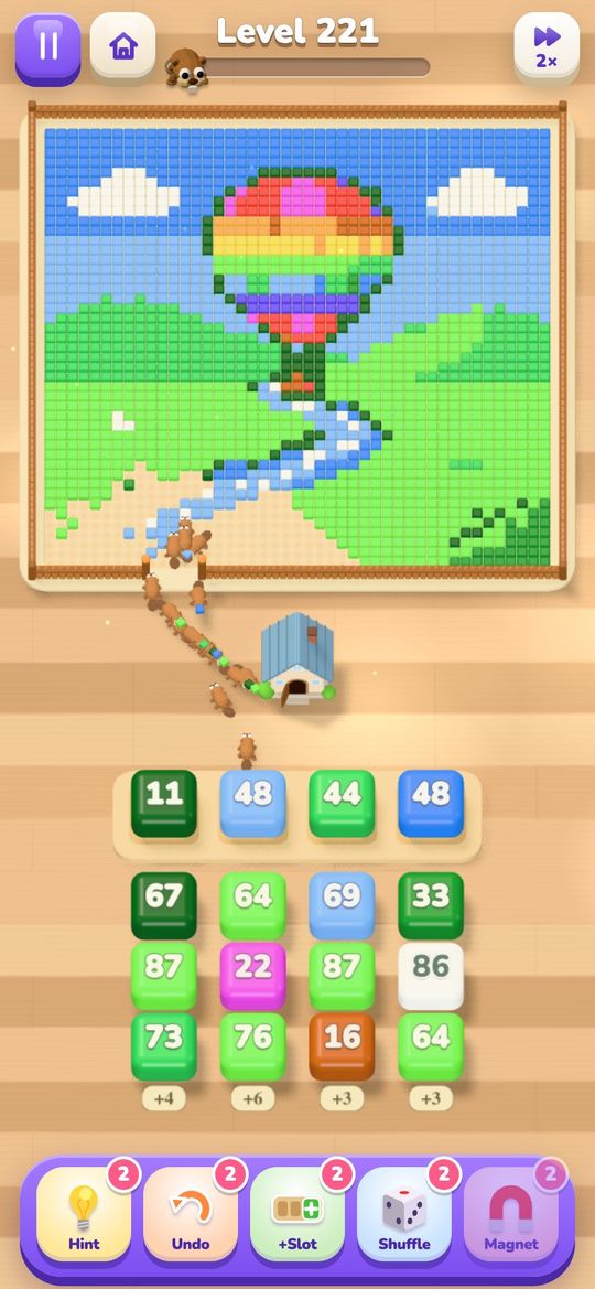 Level 221: beavers eat a path up a green valley towards a rainbow hot-air balloon.